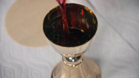 Eucharist-Wine-Being-Poured-Catholic-Church-Cinematic-4K