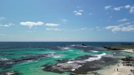 Aerial:-Longreach-Bay,-Rottnest-Island,-Western-Australia,-pristine-beach,-and-turquoise-waters