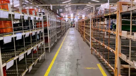 Forward-shot-explores-factory-warehouse.-Industrial-scene-videos