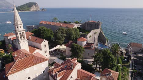 Aerial:-Budva-Holy-Trinity-Church-overlooking-Adriatic-Sea-Montenegro