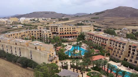 Drone-flight-over-hotel-complex-and-its-surroundings-on-the-Maltese-island-of-Gozo
