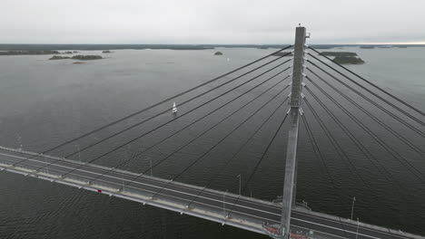 Cruising-Sailboat-Close-To-Replot-Bridge-In-Finland-During-Autumn-Season