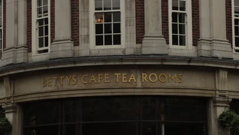 Hand-held-shot-of-the-famous-Bettys-Cafe-Tea-Room-in-York-city-center