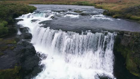 Aerial:-Reykjafoss-waterfall-presents-itself-as-a-powerful-cascade-of-water