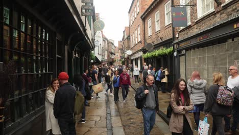 Hand-held-shot-of-the-famous-Shambles-in-York-filled-with-tourists-during-the-holidays