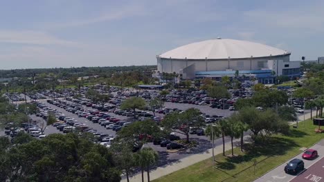 4K-Aerial-Drone-Video-of-Fans-Arriving-at-Parking-Lot-of-Tropicana-Field-in-Downtown-St