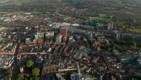 High-aerial-shot-from-central-Reading-towards-train-station
