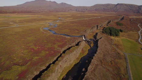 Tectonic-plates-fault-in-Thingvellir-National-Park-and-Oxararfoss-waterfall