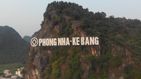 Aerial-view-of-big-Phong-nha-ke-bang-sign-on-mountain-at-Vietnam