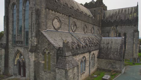A-drone-4K-shot-of-St-Canice's-Church-of-Ireland-cathedral-and-Round-Tower-Kilkenny