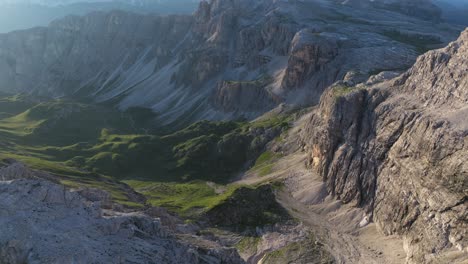 The-Dolomites-present-a-breathtaking-juxtaposition-of-rugged-cliffs-and-serene-valleys,-bathed-in-soft-light