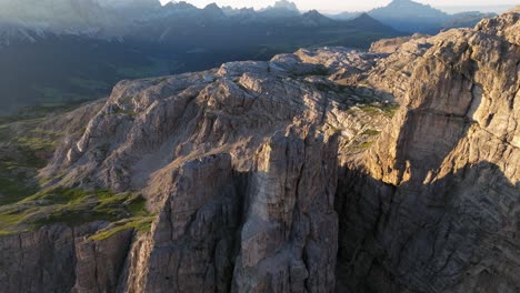 Cinematic-aerial-voyage-over-the-Dolomites'-labyrinth-of-peaks-and-valleys,-reflecting-the-raw-beauty-and-unyielding-spirit-of-this-iconic-mountain-range