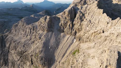 In-the-heart-of-the-Dolomites,-rugged-mountain-peaks-stand-tall,-their-rocky-facades-sculpted-by-time