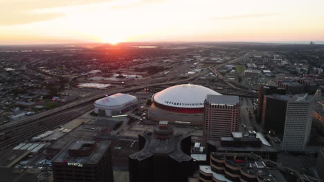Establishing-drone-shot-of-the-Mercedes-benz-Superdome,-sunny-evening-in-New-Orleans