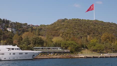 Turkish-flag-on-scene-hilltop-landscape-overlooking-Bosphorus-Strait
