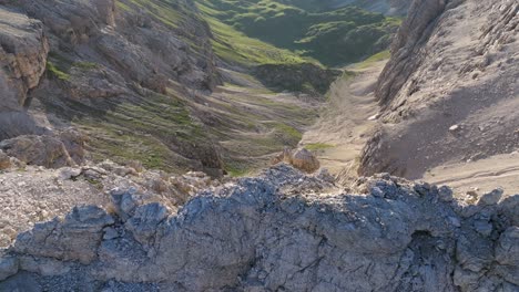 Majestic-Dolomites-landscape-at-Campill,-showcasing-striking-limestone-formations,-lush-valleys,-and-contrasting-shadows