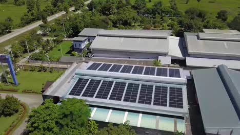 Aerial-View-of-Large-Scale-Solar-Panels-on-Modern-Factory-Roof