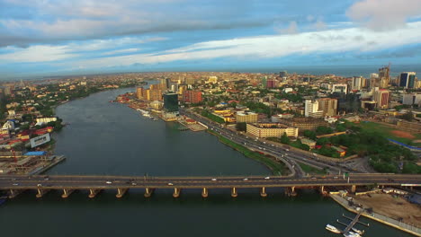Victoria-Island,-Lagos,-Nigeria-along-the-coastline---aerial-flyover