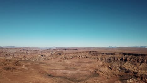 Fish-River-Canyon-in-Namibia,-Africa-Aerial-Drone-Shot