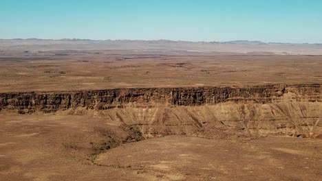Fish-River-Canyon-in-Namibia,-Africa-Aerial-Drone-Shot
