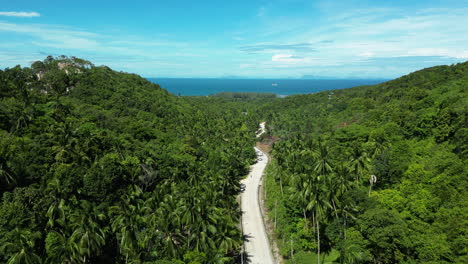 Traveling-through-Highlands-of-Party-Island-Koh-Phangan,-aerial-drone-view