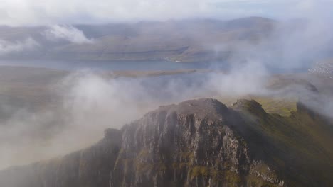 Circular-drone-footage-of-the-Slættaratindur-summit-on-the-Eysturoy-island-in-the-Faroe-Islands