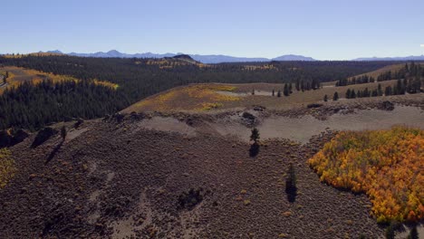 Fall-Colors-at-Sage-Hen-Summit-in-Mono-County,-California---Aerial-orbit-shot-pull-back-to-reveal-fall-colors