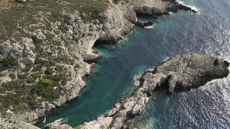 Aerial-shot-of-Zakynthos-island,-Greece-with-beautiful-blue-water