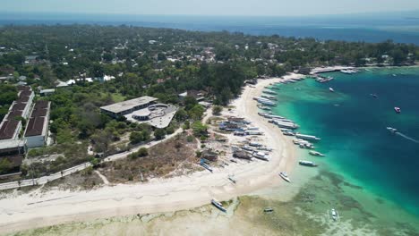 Aerial-over-Gili-Air-Beach-west,-located-on-the-idyllic-island-of-Gili-Air-in-Indonesia,-is-a-true-tropical-paradise-that-captures-the-essence-of-serene-island-life