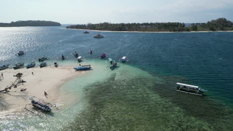 Aerial-over-Gili-Kedis,-a-charming-little-gem-located-in-the-Sekotong-area-of-Indonesia,-perfect-destination-to-enjoy-quality-time-with-friends-and-family
