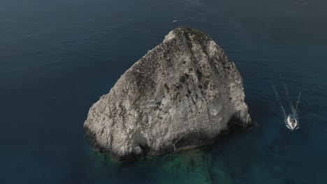 Aerial-drone-video-of-iconic-geological-phenomenon-of-blue-caves-in-northern-Zakynthos-island-with-deep-sapphire-rocky-seascape