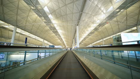 Automatic-walkway,-and-flat-escalator-in-Hong-Kong-International-Airport