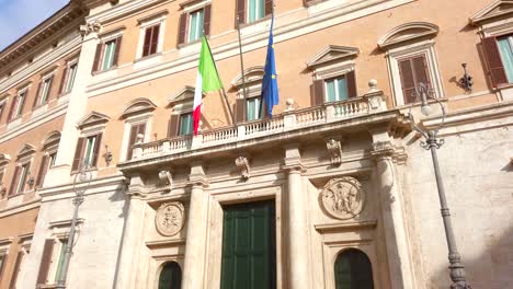 Main-entrance-of-Palazzo-Montecitorio,-a-palace,-seat-of-the-Chamber-of-Deputies,-the-lower-house-of-the-Italian-Parliament