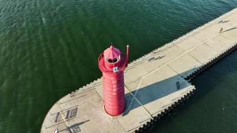 Close-aerial-movement-around-thee-old-lighthouse-on-the-Southside-of-the-channel