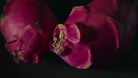 Dragon-fruit-macro-close-up-spinning-on-a-plate-with-a-dark-background