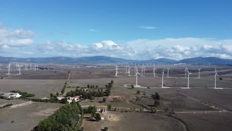 wind-turbines-in-zahara-in-spain,-drone-footage