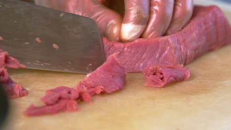 Chinese-chef-precisely-slicing-meat---Authentic-scene