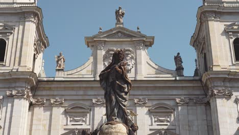 Zoom-in-of-Facade-of-Salzburg-Cathedral-and-Statue-in-Front-of-It