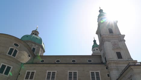Sun-Flare-Shines-Very-Bright-onto-Side-Wall-and-Towers-of-Salzburg-Cathedral