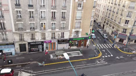 Paris-Aerial-Street-View-from-Rooftop,-Daylight-at-Hoche-Pantin-Metro-Avenue-Traditional-Architecture,-Traffic-and-People-Walking