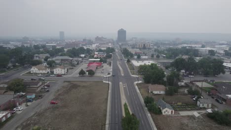 Wildfire-Smoke-covering-City-of-Billings,-Montana-in-Summer---Aerial