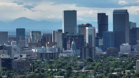 Cityscape-of-Denver-with-Colorado-mountain-ranges-backdrop