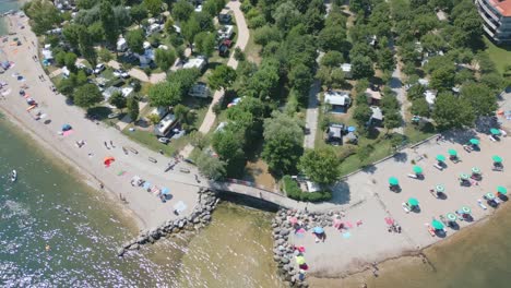 Aerial-Shot-of-Camping-Baia-Verde-Shore-at-Lake-Garda,-Italy