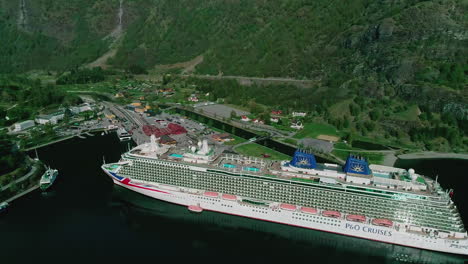 Aerial-overview-of-P-O-cruises-ship-docked-at-the-port-of-Flam,-in-Central-Norway