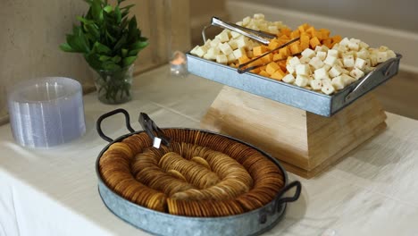 Cheese-Cubes-and-Crackers-Charcuterie-Party-Reception-Snack-Food-on-Display-Table