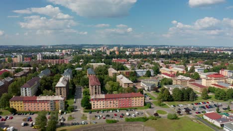 Aerial-drone-shot-of-a-czech-big-city-Ostrava-with-buldings,-cars,-roads-and-apartments-during-summer