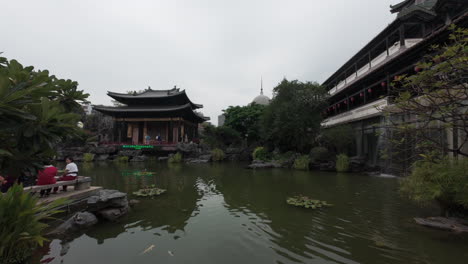 View-of-Traditional-Chinese-Opera-centre-with-beautiful-water-pool-and-traditional-Chinese-architecture-buildings