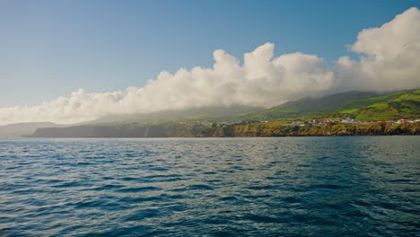 Picturesque-view-from-the-boat-of-the-beautiful-local-town-of-Vila-Franco-Do-Campo,-Sao-Miguel-island,-Azores---Portugal