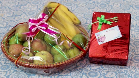 fruit-gift-wrap-filled-with-different-fruits-and-gift-pack-from-flat-angle
