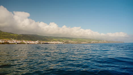 Picturesque-view-from-the-boat-of-the-beautiful-local-town-of-Vila-Franco-Do-Campo,-Sao-Miguel-island,-Azores---Portugal
